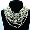 Ivory Cascade Multi-Layer Beaded Statement Necklace