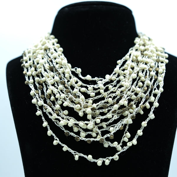 Ivory Cascade Multi-Layer Beaded Statement Necklace