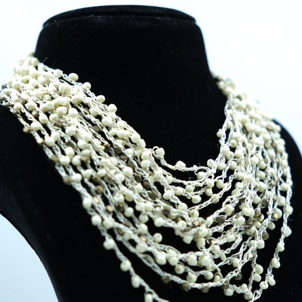 Ivory Cascade Multi-Layer Beaded Statement Necklace
